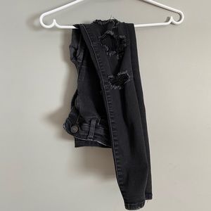 Black ripped vintage looking skinny jeans